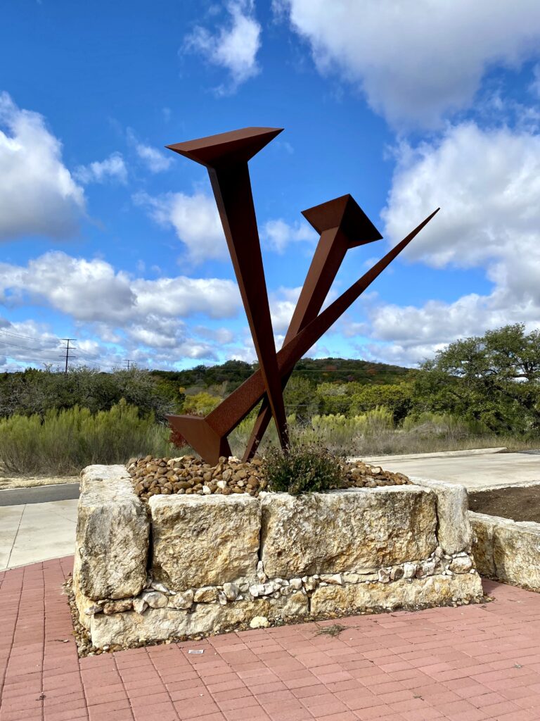 A photo of the "It Is Finished" statue.